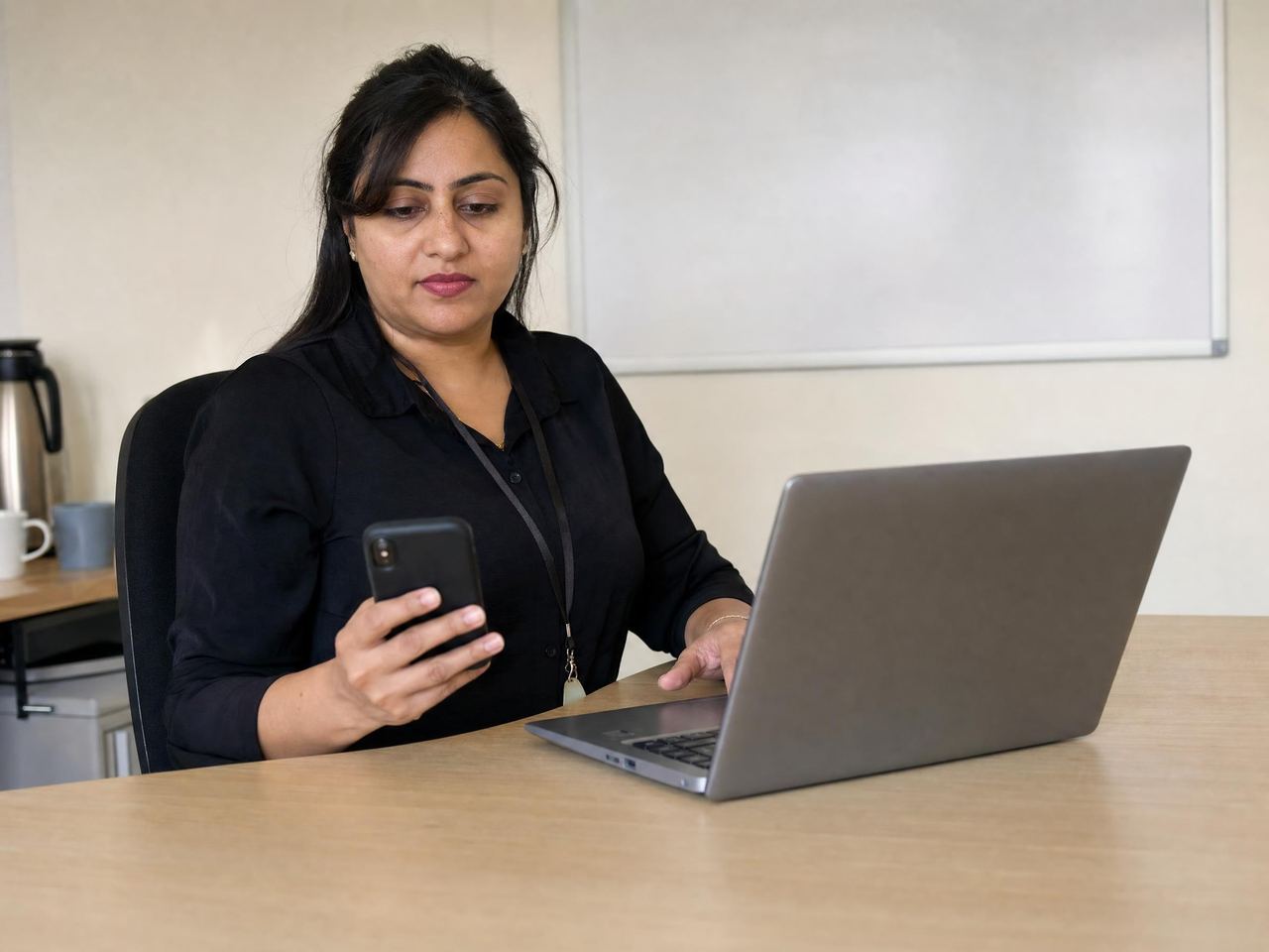Care coordinator reviewing this morning’s visit coverage before calling the on-call carer